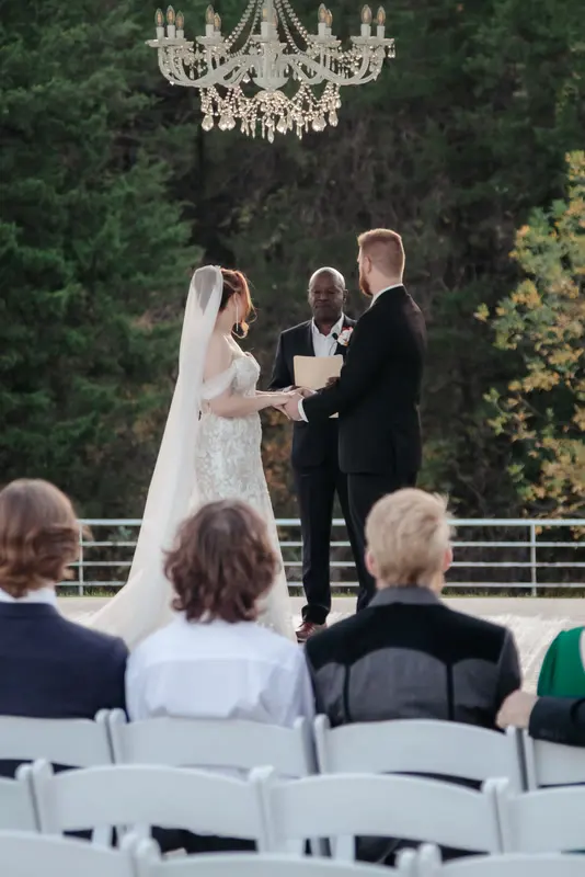 Ceremony at a glass-walled venue, photo 32