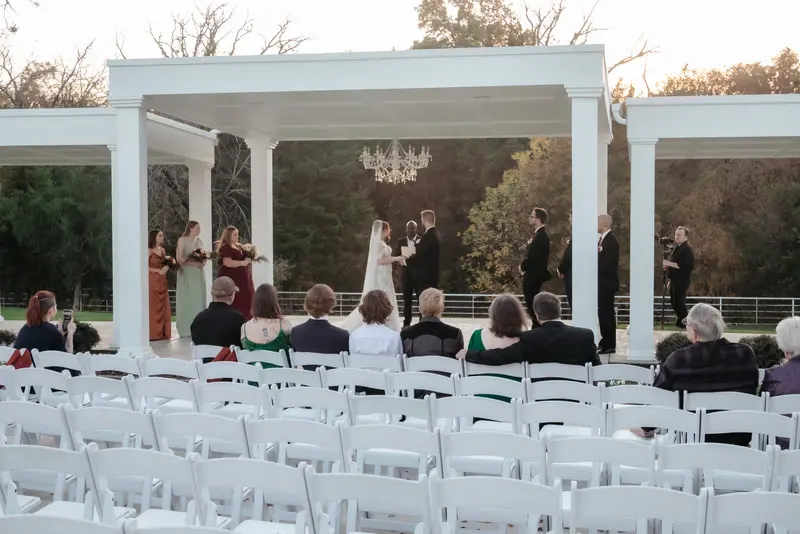 Ceremony at a glass-walled venue, photo 35