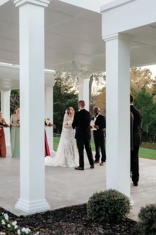 Ceremony at a glass-walled venue, photo 38