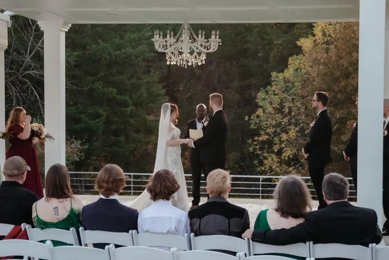 Ceremony at a glass-walled venue, photo 44